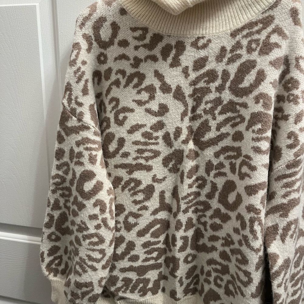 Animal print turtle neck sweater